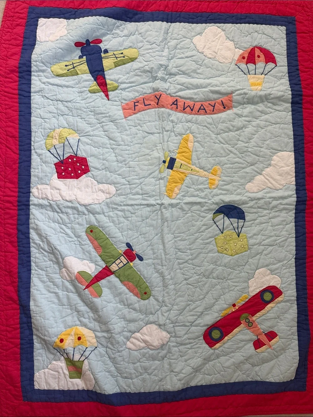 NEVER USED. NEW. Children's Airplane Quilted Throw - Red & Blue